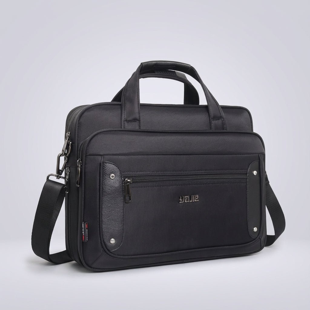 Canvas laptop bag featuring a multi-pocket design and adjustable strap, suitable for 14 to 19 inch laptops, ideal for work or travel. 0